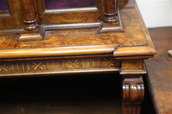 A Victorian burr walnut and marquetry cabinet on bookshelf, by Wilkinson & Son, W.3ft 6in.